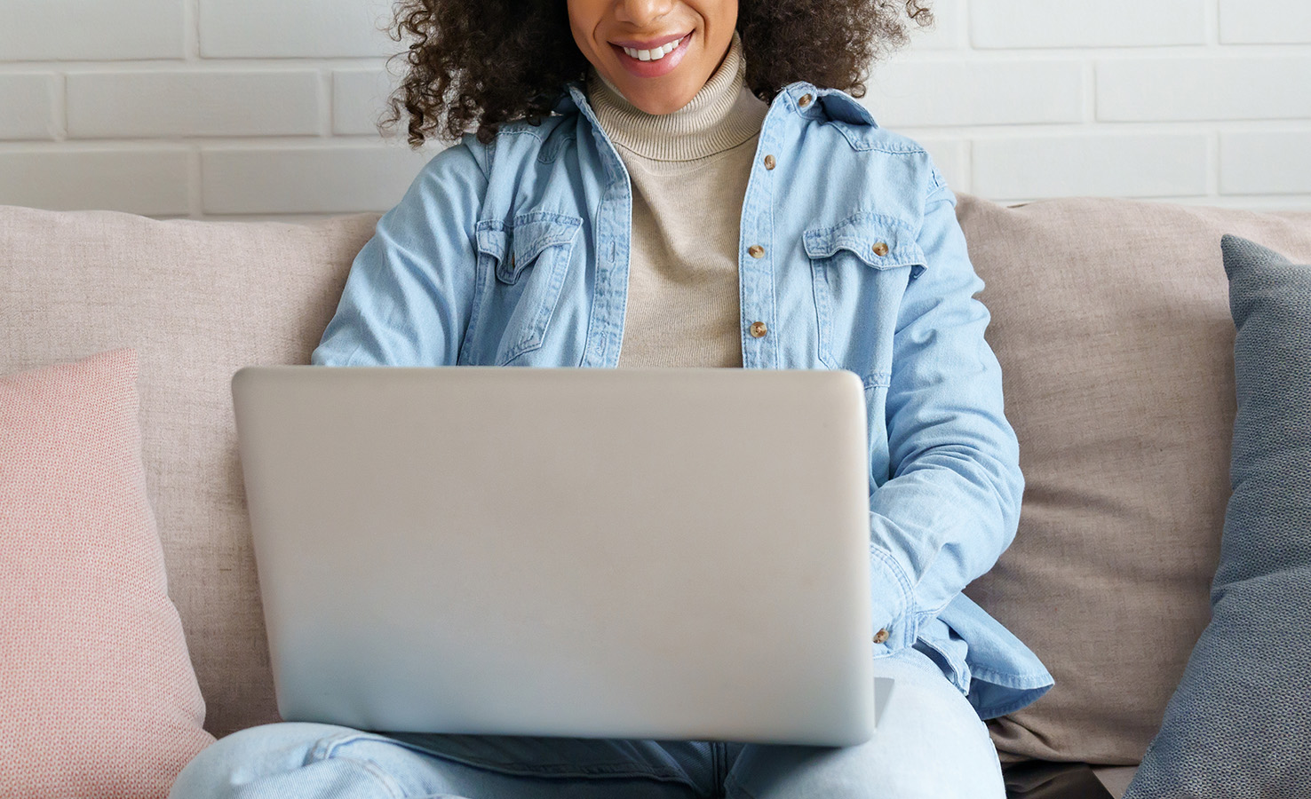 Woman looking at laptop screen